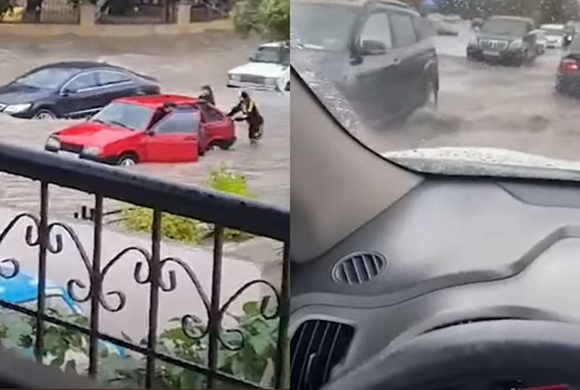 Сильный дождь создал трудности для водителей в Баку - ВИДЕО