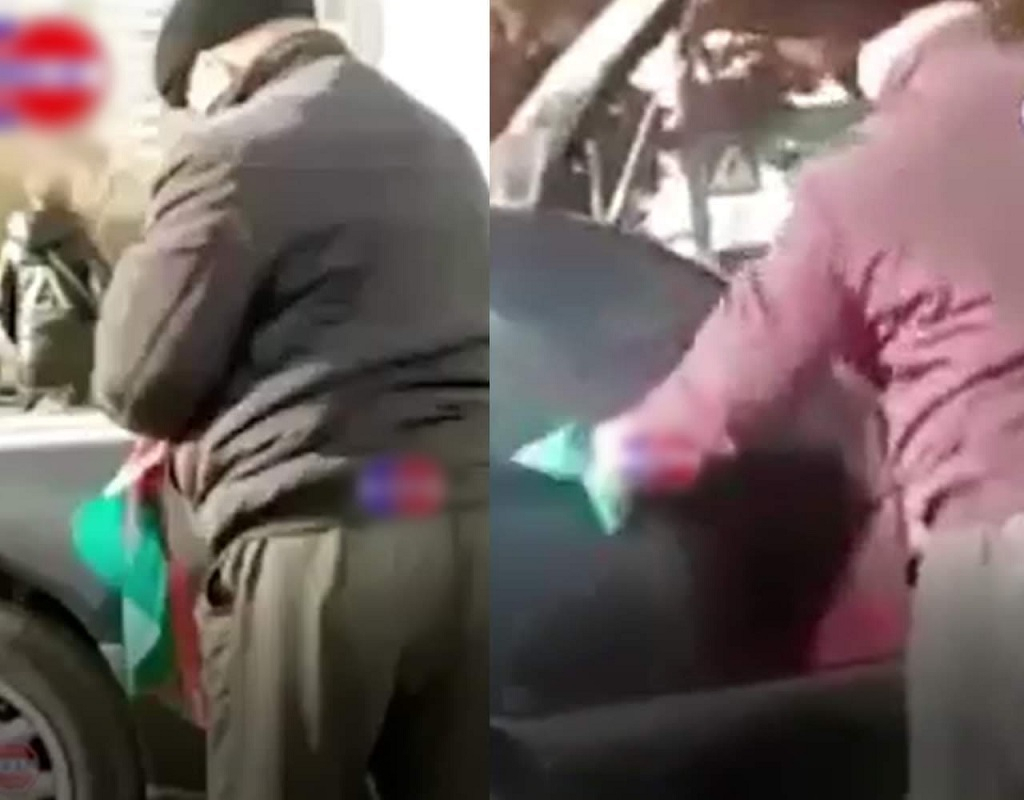 Таксист, протиравший свой автомобиль государственным флагом, извинился - ОБНОВЛЕНО + ВИДЕО