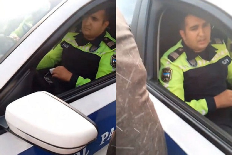 В Баку между сотрудниками дорожной полиции и водителем произошел конфликт - ВИДЕО
